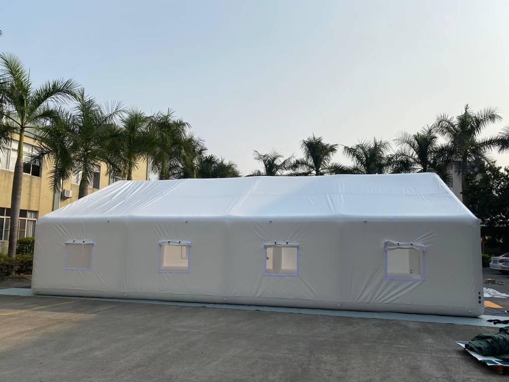 Inflatable tent for events with multiple ventilation windows