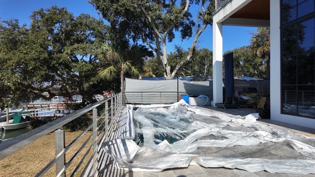 Positioning the enclosure on pool deck