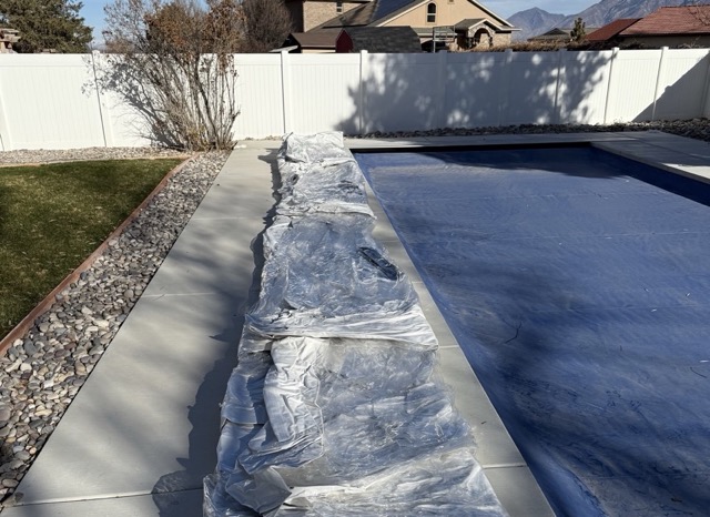 Preparing backyard site for pool enclosure