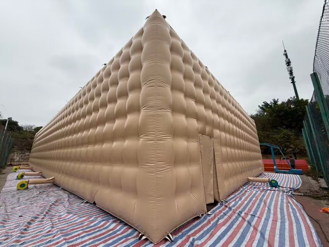 large inflatable tent with blower