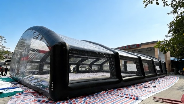 Setting up the inflatable soccer tent